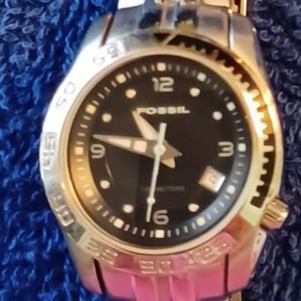 Unisex FOSSIL BLUE AM4099 with black face andnew battery